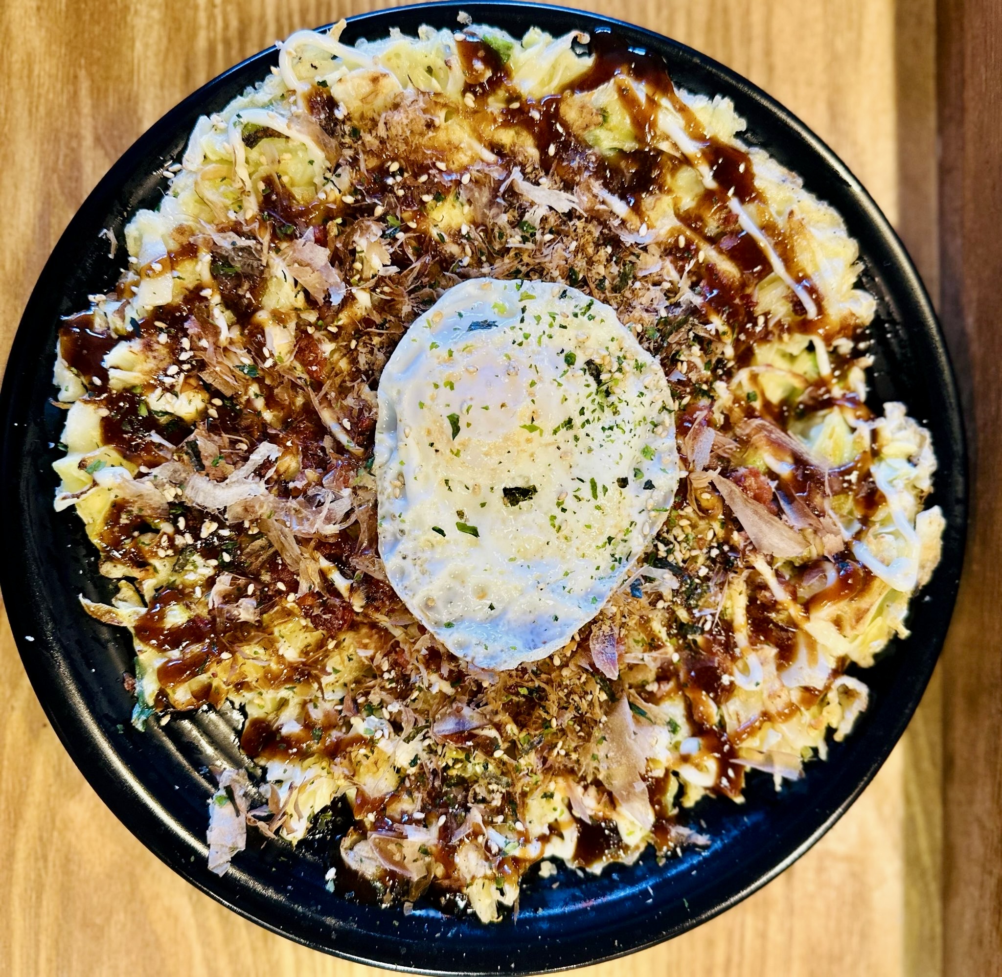 A plate of okonomiyaki